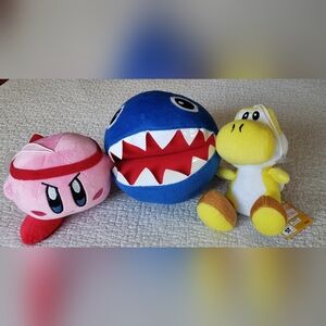 A set of 2 Super Mario and 1 Kirby stuffies